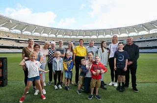 Visitors on the field during an Optus Stadium tour